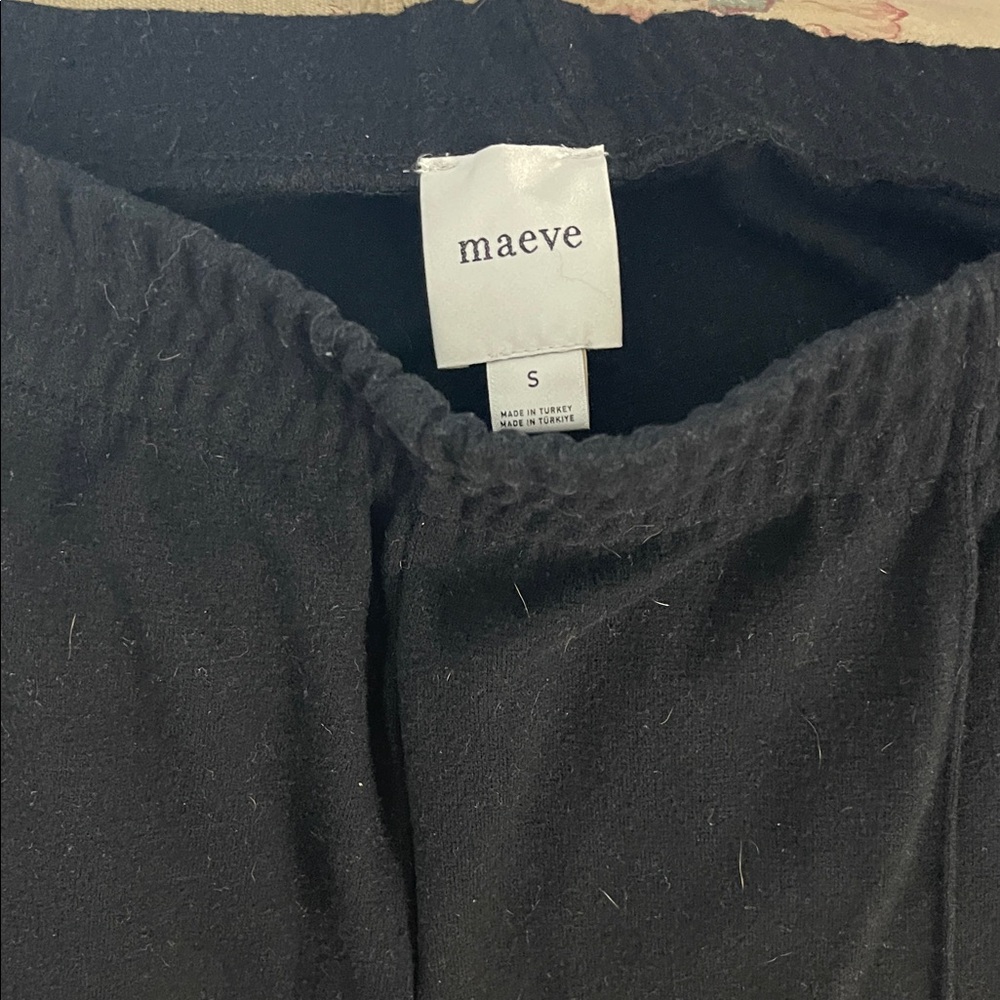 Maeve black track pants with white stripe. Boot cut. Plenty of life left in them